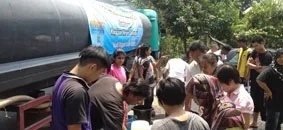 Justbaan Transport water tanker supplying clean water to a community