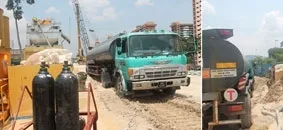 Justbaan Transport tanker delivering water on a construction site